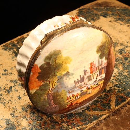 1186 - A George III South Staffordshire enamel circular table snuff box, hinged cover painted with an Itali... 