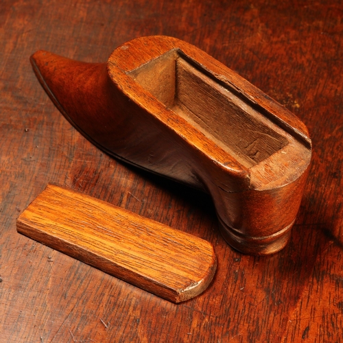 1177 - A 19th century mahogany novelty snuff box, as a shoe, sliding cover, 10cm long