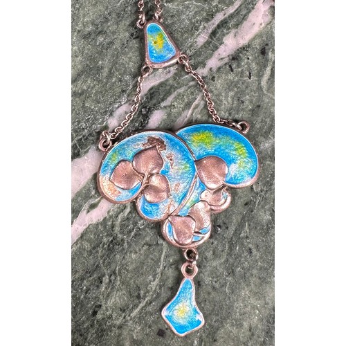 1031 - Charles Horner - an Art Nouveau silver and enamel pendant, decorated in mottled tones of green and b... 