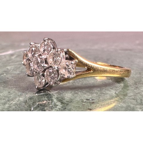 949 - A diamond ring, lozenge crest set with nine round brilliant cut diamonds, total estimated diamond we... 