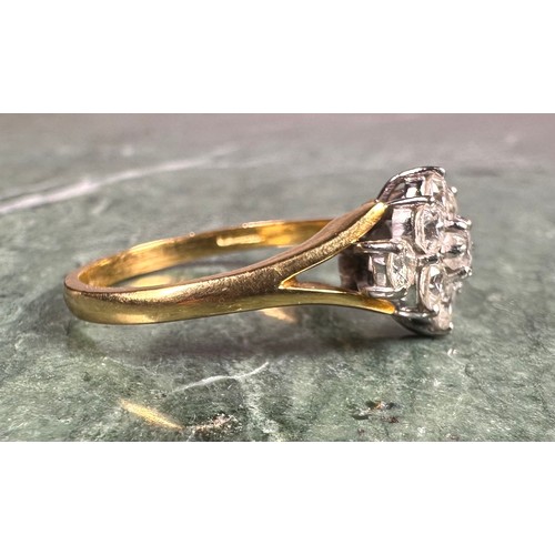 949 - A diamond ring, lozenge crest set with nine round brilliant cut diamonds, total estimated diamond we... 