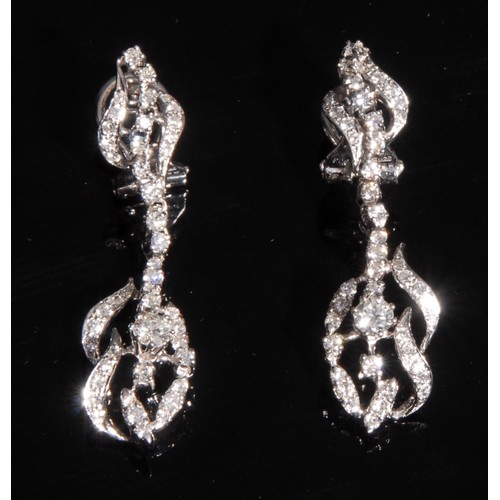 974 - A pair of diamond pedant earrings, each set with forty five round brilliant and mixed cut diamonds, ... 