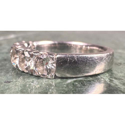 948 - A diamond ring, linear set with five round brilliant cut diamonds, total estimated diamond weight ap... 