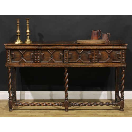 1625 - A Charles II oak low block front dresser, moulded oversailing top above two drawers, applied with ge... 