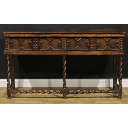 1625 - A Charles II oak low block front dresser, moulded oversailing top above two drawers, applied with ge... 