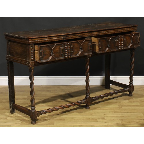 1625 - A Charles II oak low block front dresser, moulded oversailing top above two drawers, applied with ge... 