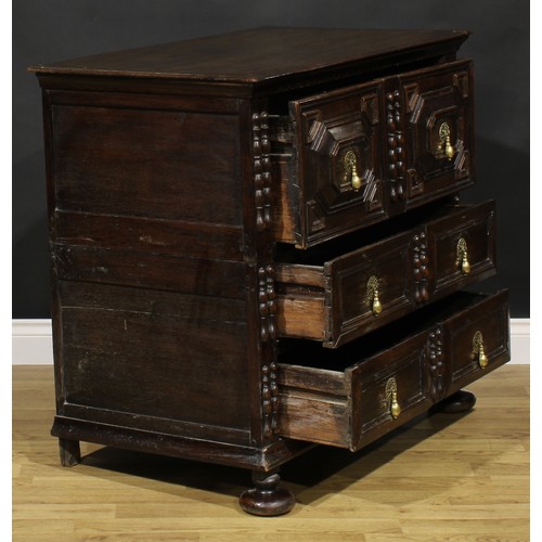 1622 - A Charles II oak chest, rectangular top above three drawers, applied with geometric mouldings and sp... 