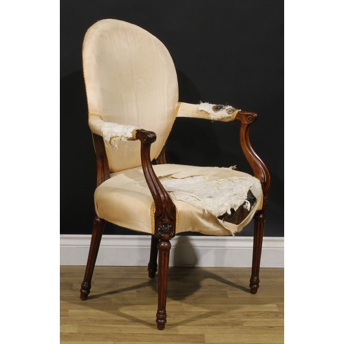 1594 - A pair of 19th century French Hepplewhite mahogany elbow chairs, each with scroll hand rests, fluted... 