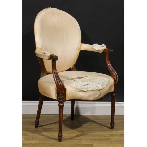 1594 - A pair of 19th century French Hepplewhite mahogany elbow chairs, each with scroll hand rests, fluted... 