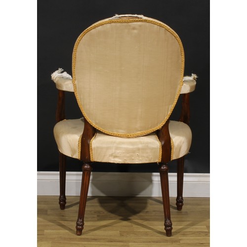 1594 - A pair of 19th century French Hepplewhite mahogany elbow chairs, each with scroll hand rests, fluted... 