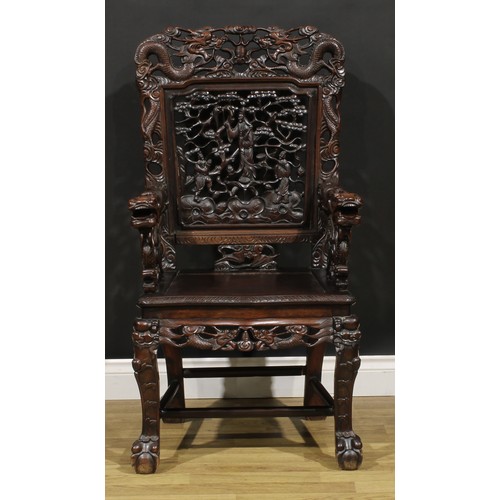 1628 - A Chinese hardwood armchair, pierced and profusely carved with dragons, Guanyin and attendants, 111c... 