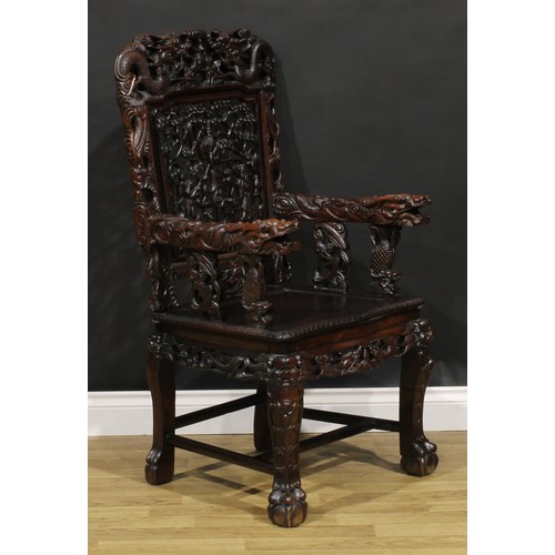 1628 - A Chinese hardwood armchair, pierced and profusely carved with dragons, Guanyin and attendants, 111c... 