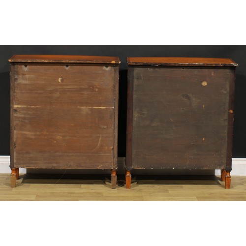 1604 - A pair of Sheraton Revival tulipwood banded satinwood library pier bookcases, each with a slightly o... 