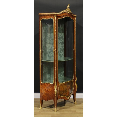 1593 - A Louis XV Revival gilt metal mounted kingwood and vernis Martin vitrtine, the lower section painted... 