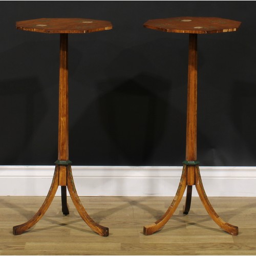 1603 - A pair of Sheraton Revival satinwood and painted urn or lamp tables, each with octagonal top, spread... 