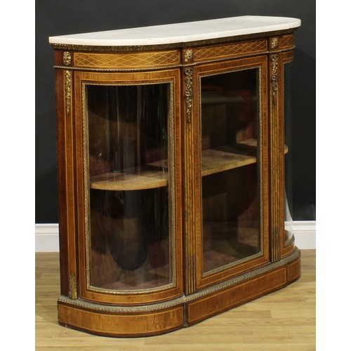 2090 - A Victorian gilt metal mounted walnut and fiddleback mahogany credenza, marble top above a glazed do... 