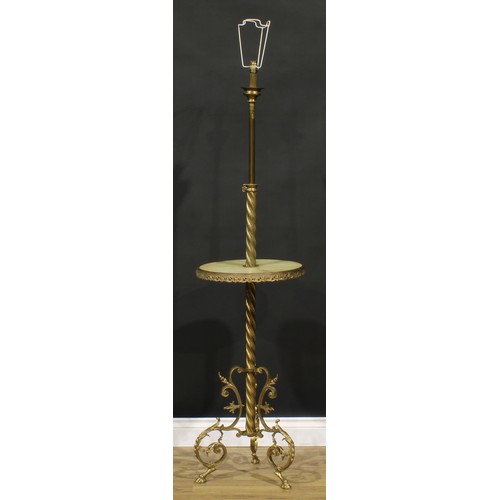 2045 - Interior Design - a gilt brass and onyx telescopic floor lamp, incorporating a circular wine plateau... 