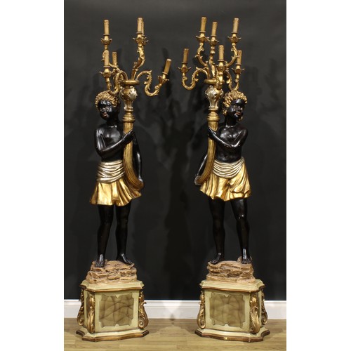 1606 - A pair of Venetian composite blackamoor floor-standing six-light candelabra, modelled as scantily cl... 