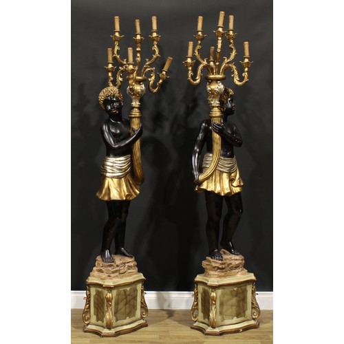 1606 - A pair of Venetian composite blackamoor floor-standing six-light candelabra, modelled as scantily cl... 