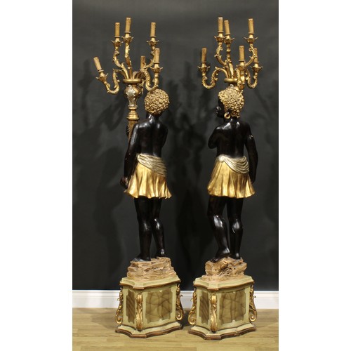 1606 - A pair of Venetian composite blackamoor floor-standing six-light candelabra, modelled as scantily cl... 