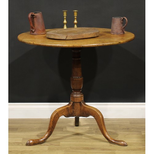 2127 - A George III oak tripod occasional table, circular tilting top, turned column, cabriole legs, pointe... 