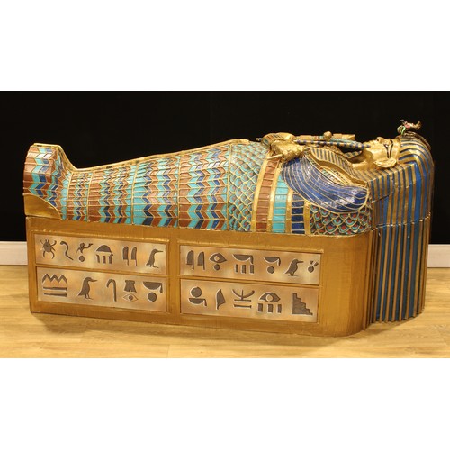 2046 - Interior Design - a large gold-coloured and polychrome painted cardboard stage prop, of Tutankhamun’... 