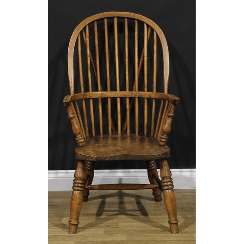 1581 - A beech, ash and elm Windsor elbow chair, hoop back, turned arm posts, saddle seat, turned legs, H-s... 