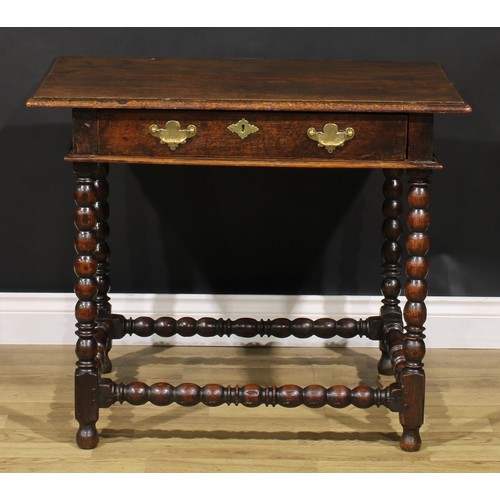 1626 - A Charles II oak side table, rectangular top above a long frieze drawer, bobbin turned legs and stre... 