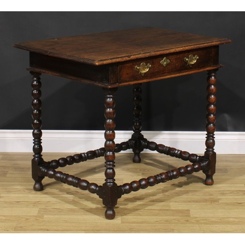 1626 - A Charles II oak side table, rectangular top above a long frieze drawer, bobbin turned legs and stre... 