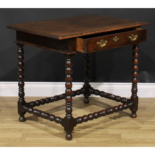 1626 - A Charles II oak side table, rectangular top above a long frieze drawer, bobbin turned legs and stre... 