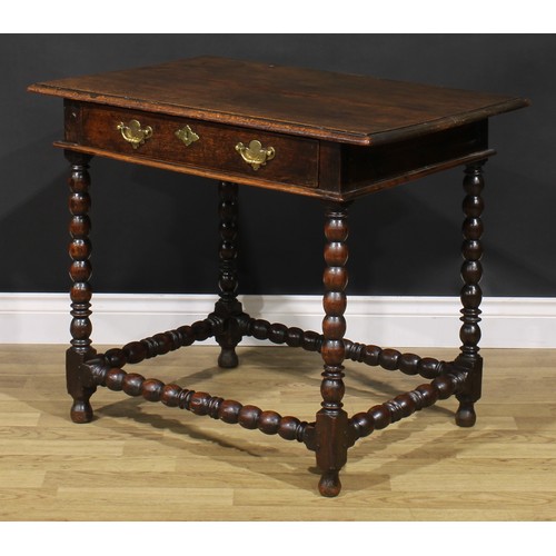 1626 - A Charles II oak side table, rectangular top above a long frieze drawer, bobbin turned legs and stre... 