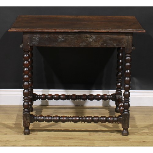 1626 - A Charles II oak side table, rectangular top above a long frieze drawer, bobbin turned legs and stre... 