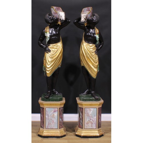 1607 - A pair of Venetian parcel-gilt and polychrome painted blackamoor torcheres, each carved as a Nubian ... 