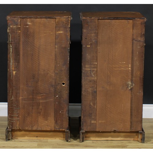 1609 - A pair of Victorian walnut and marquetry pedestal cabinets, each canted rectangular top above a frie... 