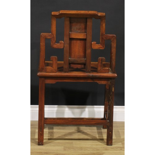 1630 - A Chinese hardwood chair, the back carved with scrolls and blossoming prunus, shaped and pierced apr... 