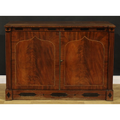 2109 - An early 19th century mahogany low press cupboard, rectangular doors inlaid with lancet arched reser... 