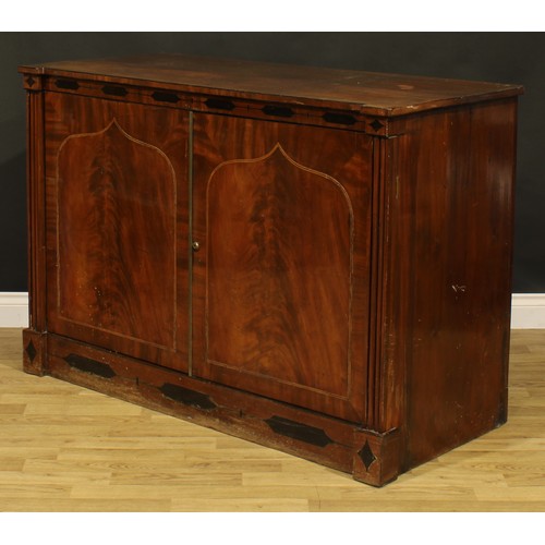 2109 - An early 19th century mahogany low press cupboard, rectangular doors inlaid with lancet arched reser... 