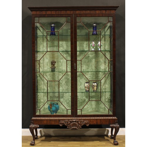 2065 - A George III Revival mahogany display cabinet, outswept cornice with meandrous capital and pendant f... 