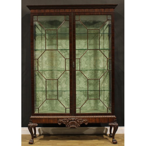 2065 - A George III Revival mahogany display cabinet, outswept cornice with meandrous capital and pendant f... 