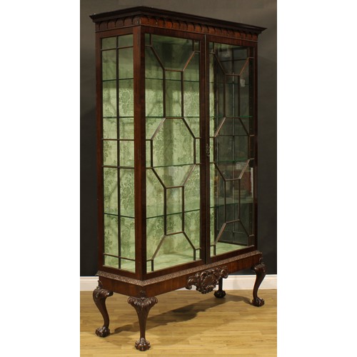 2065 - A George III Revival mahogany display cabinet, outswept cornice with meandrous capital and pendant f... 