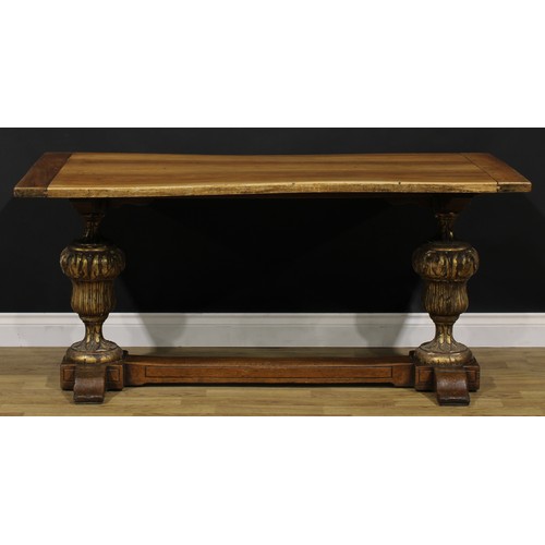 1588 - A French Provincial parcel-gilt walnut refectory table, of domestic proportions, 71cm high, 152cm lo... 