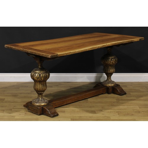 1588 - A French Provincial parcel-gilt walnut refectory table, of domestic proportions, 71cm high, 152cm lo... 