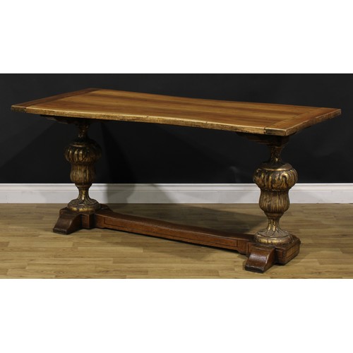 1588 - A French Provincial parcel-gilt walnut refectory table, of domestic proportions, 71cm high, 152cm lo... 