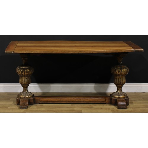 1588 - A French Provincial parcel-gilt walnut refectory table, of domestic proportions, 71cm high, 152cm lo... 