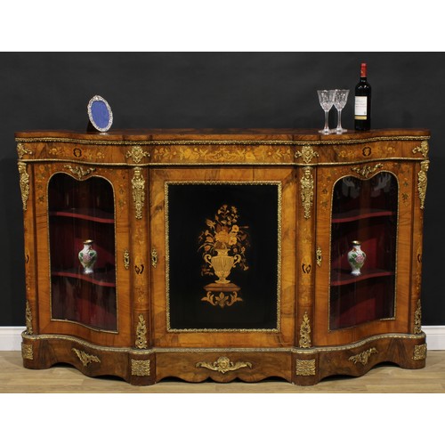 2067 - A Victorian gilt metal mounted walnut and marquetry credenza, slightly oversailing top above a centr... 