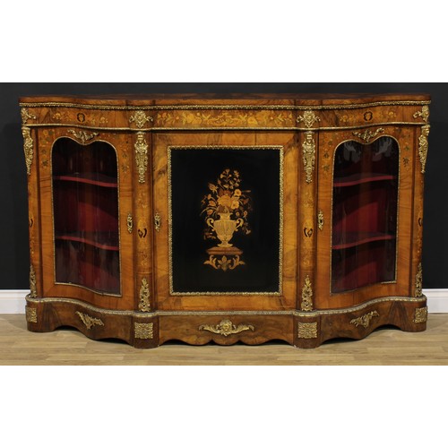 2067 - A Victorian gilt metal mounted walnut and marquetry credenza, slightly oversailing top above a centr... 