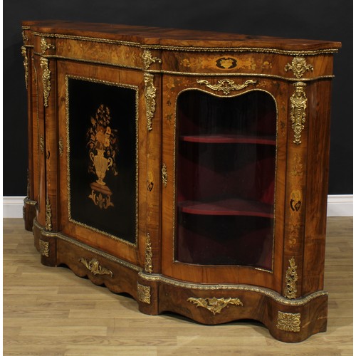 2067 - A Victorian gilt metal mounted walnut and marquetry credenza, slightly oversailing top above a centr... 