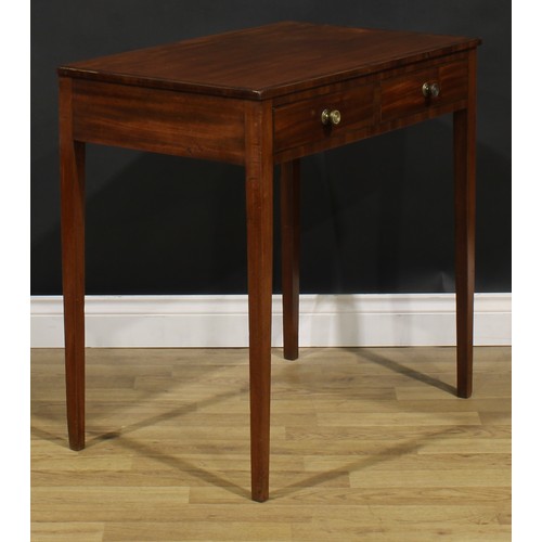 1812 - A George III mahogany side table, crossbanded rectangular top above a pair of frieze drawers, tapere... 