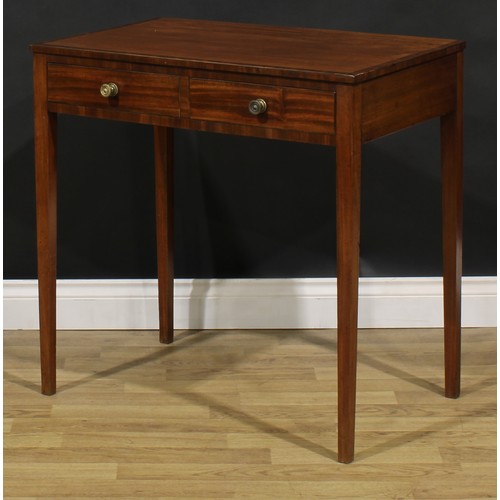 1812 - A George III mahogany side table, crossbanded rectangular top above a pair of frieze drawers, tapere... 