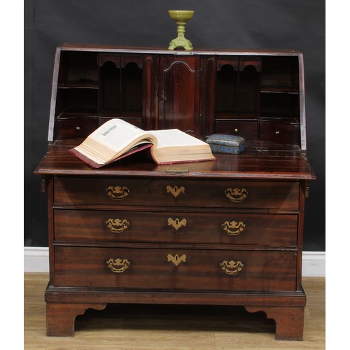 2038 - An unusual George II/early III laburnum bureau, fall front enclosing a cupboard flanked by secret co... 